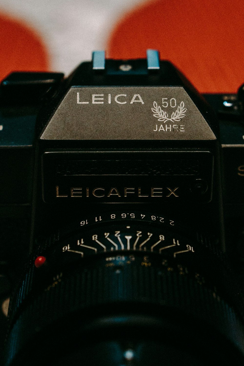 a leica camera sitting on top of a table