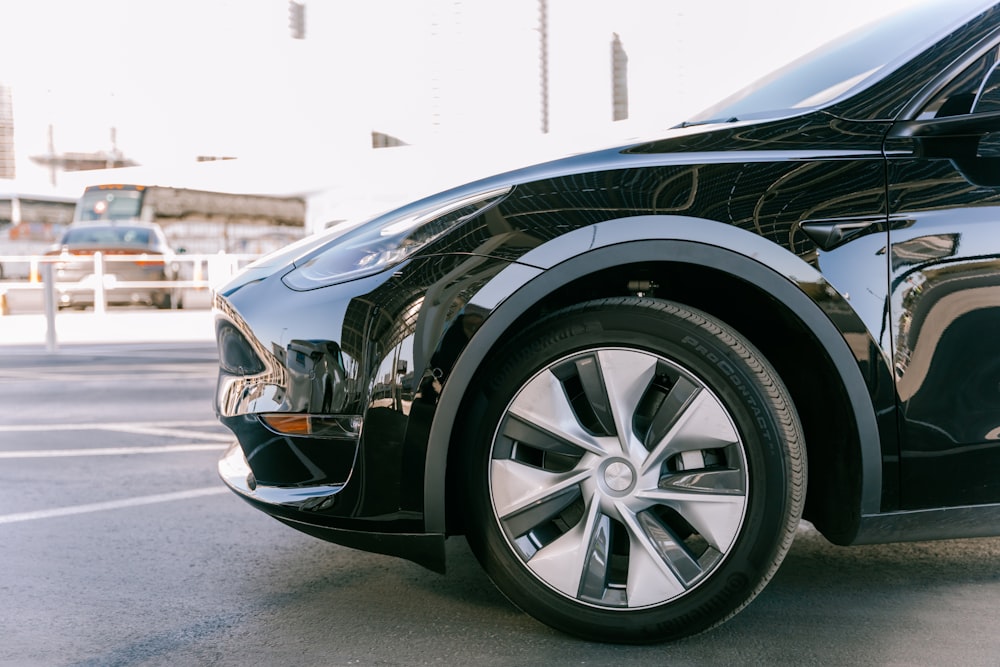 a close up of a car parked in a parking lot