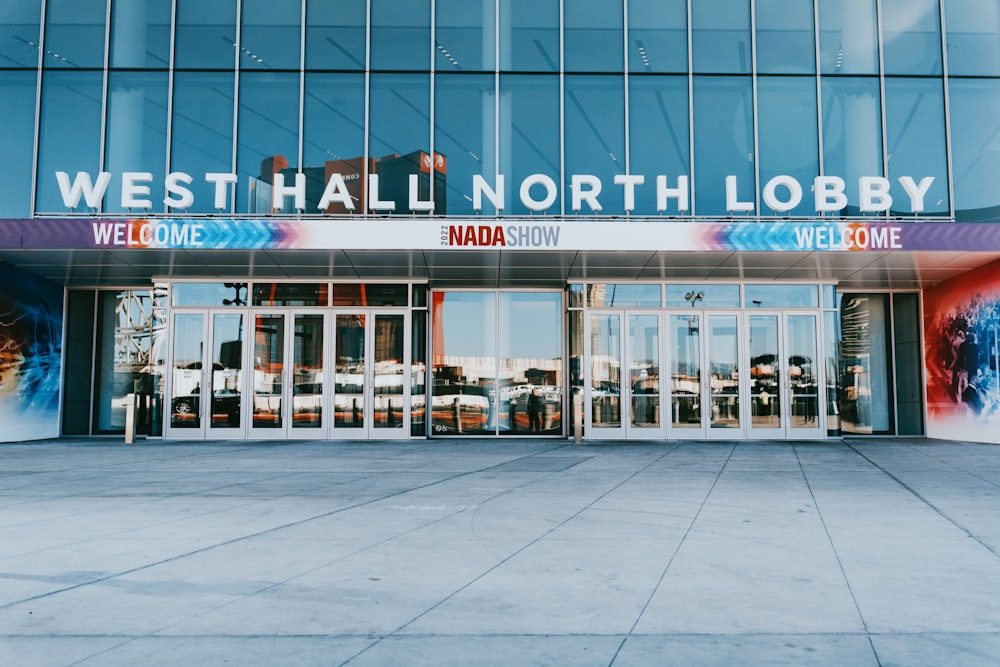 a building with a sign that says west hall north lobby