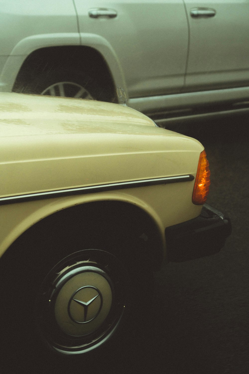 a close up of a car parked in a parking lot