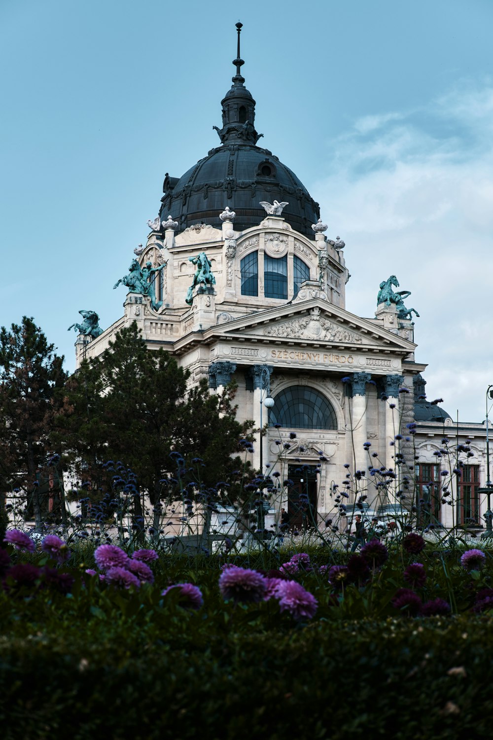 a large building with a clock on the top of it