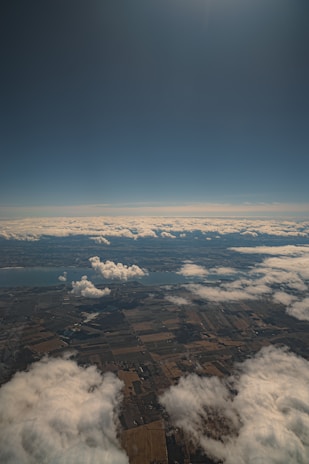 Aerial view of makhana cultivation fields under a clear sky.