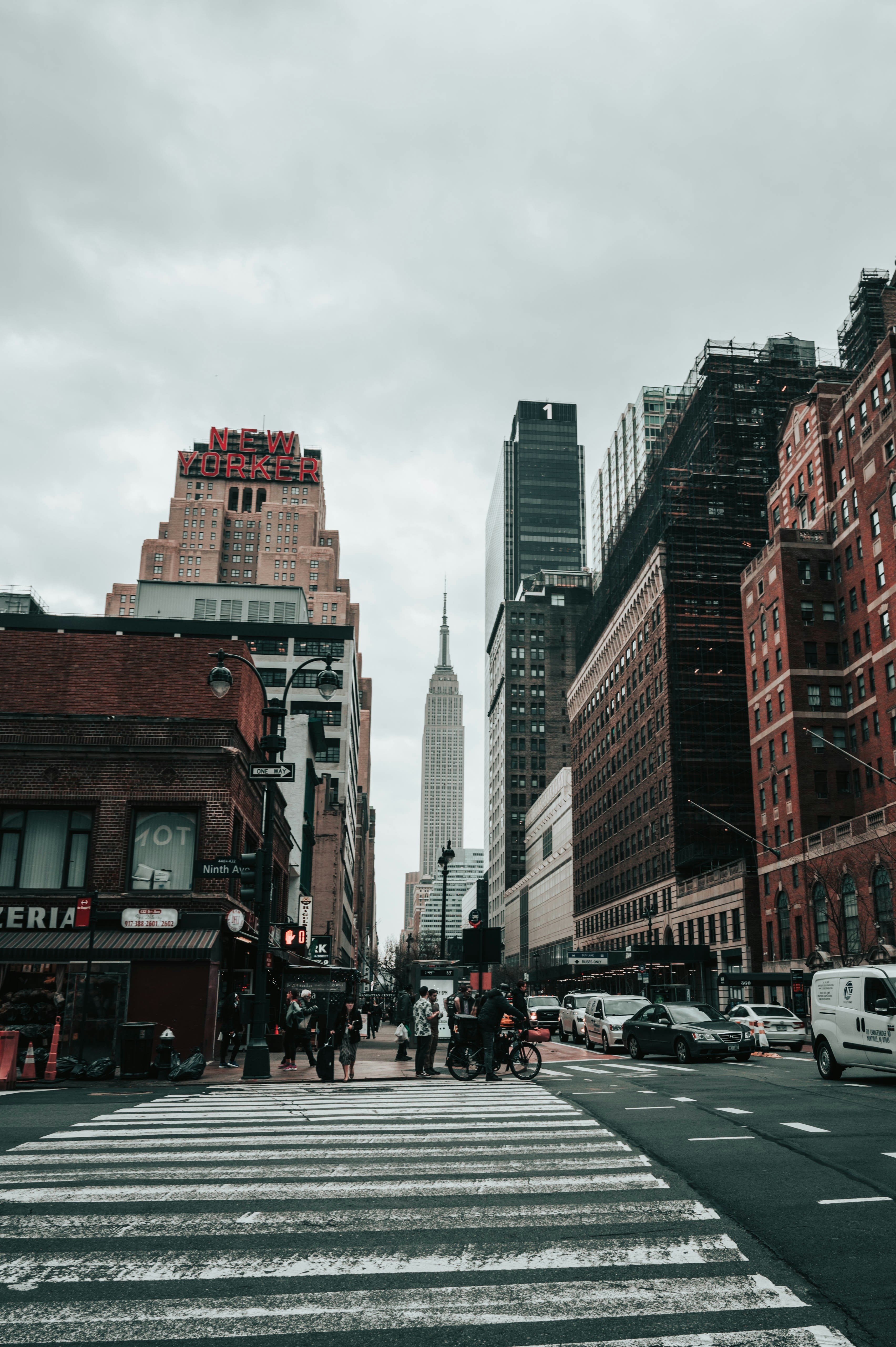 a-city-street-filled-with-lots-of-tall-buildings-photo-free-road