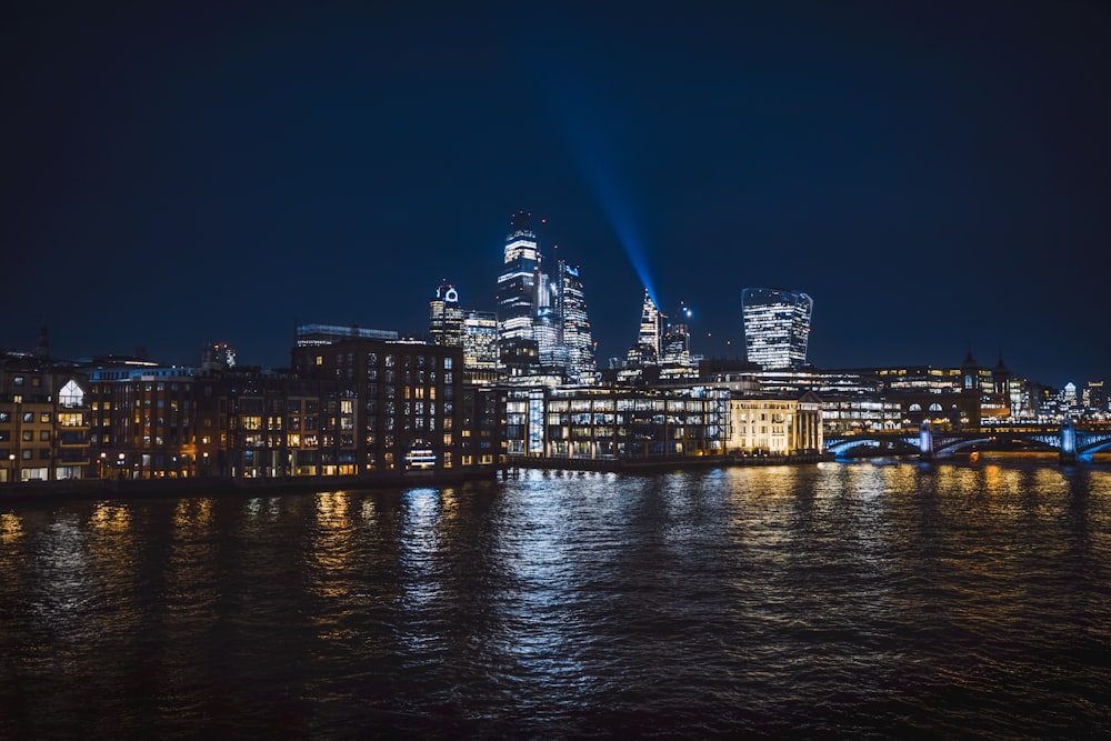 a view of a city at night from across the water