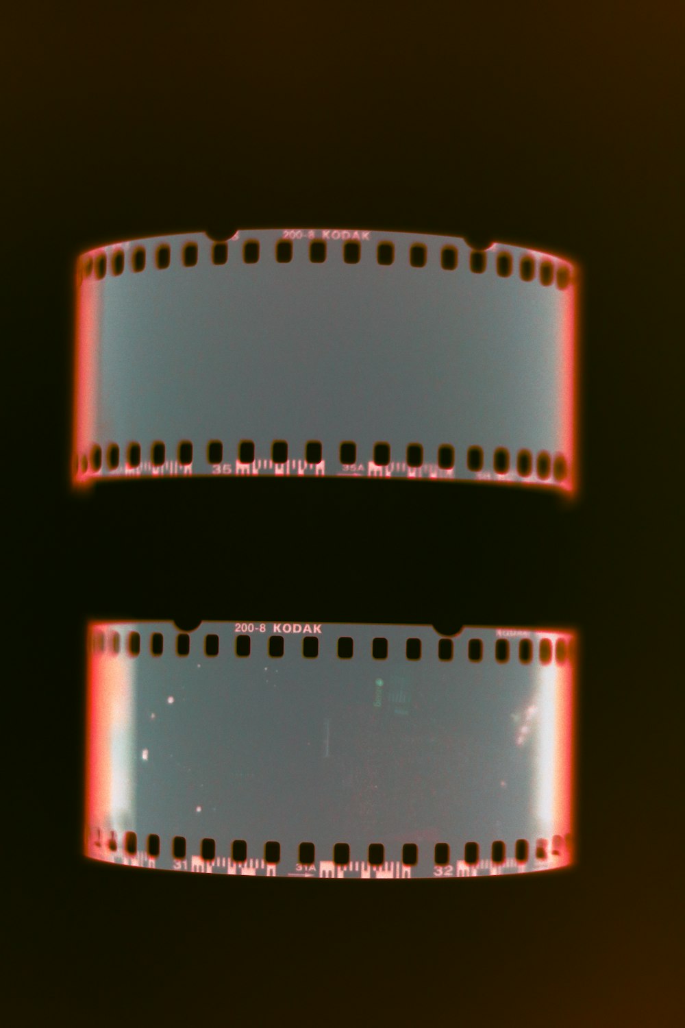 a close up of a film strip on a black background