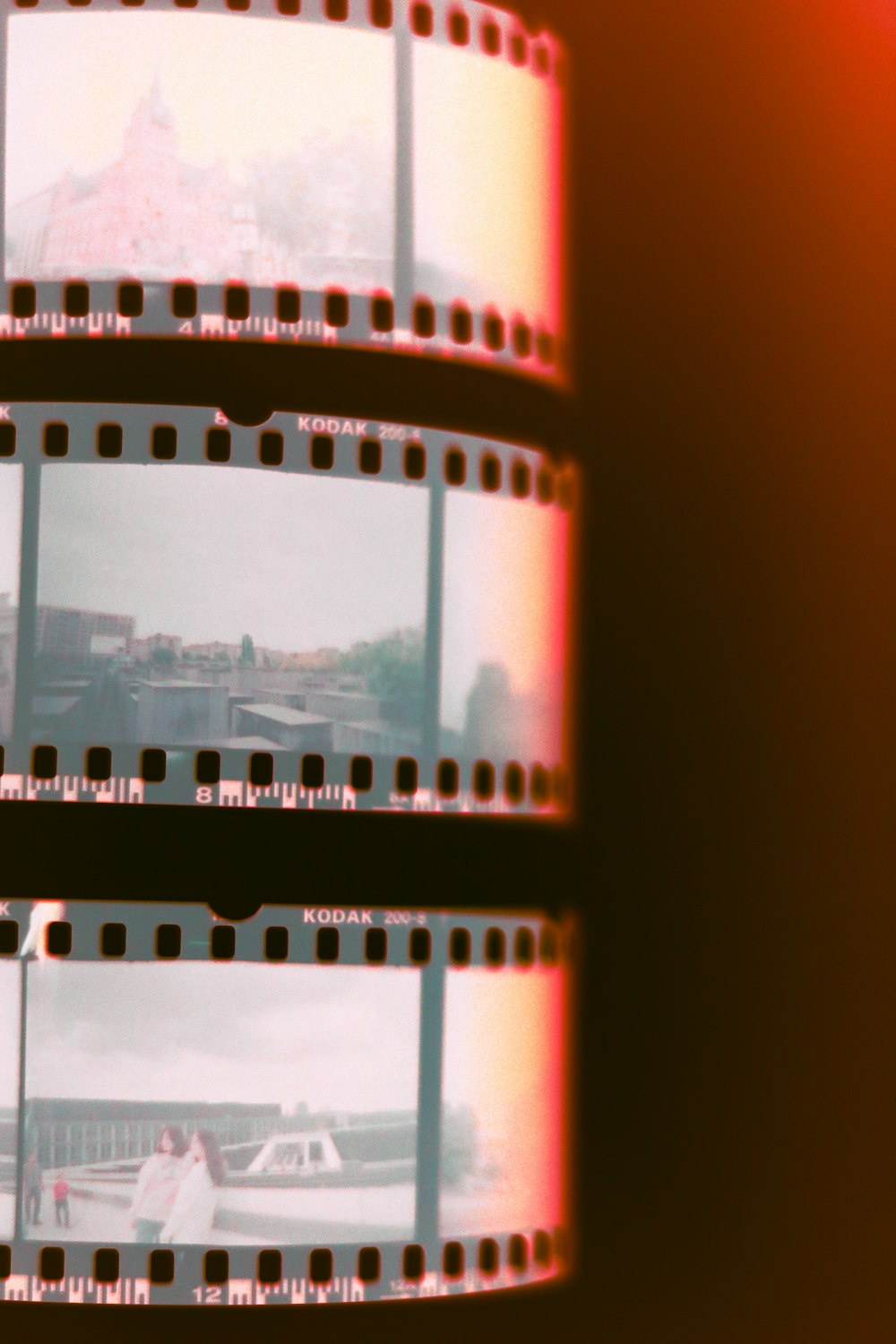 a film strip with a picture of a building in the background