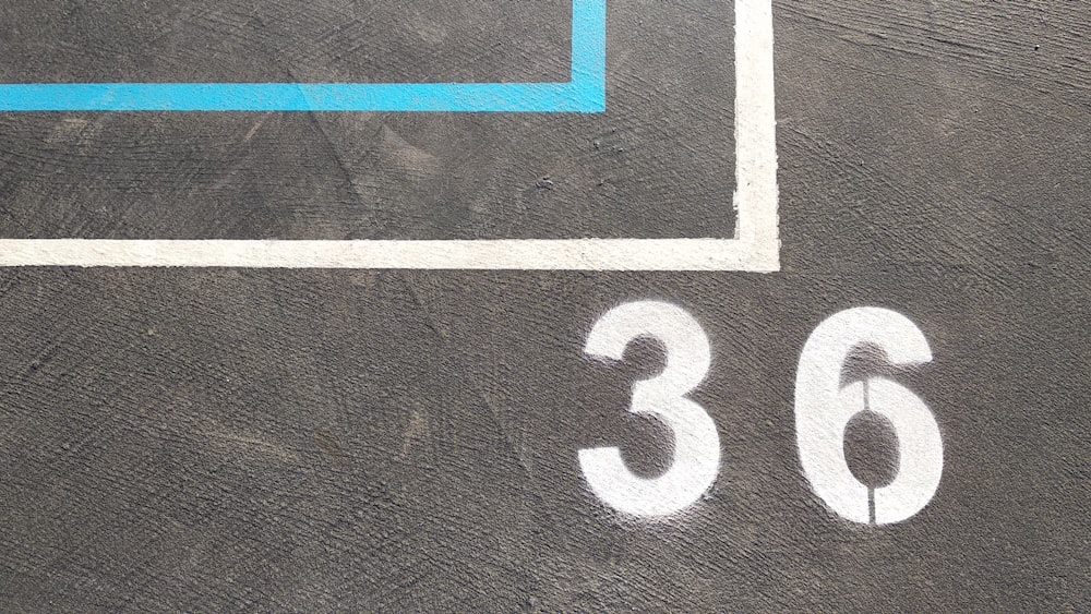 a close up of a number on a tennis court