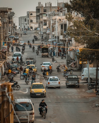 a city street filled with lots of traffic