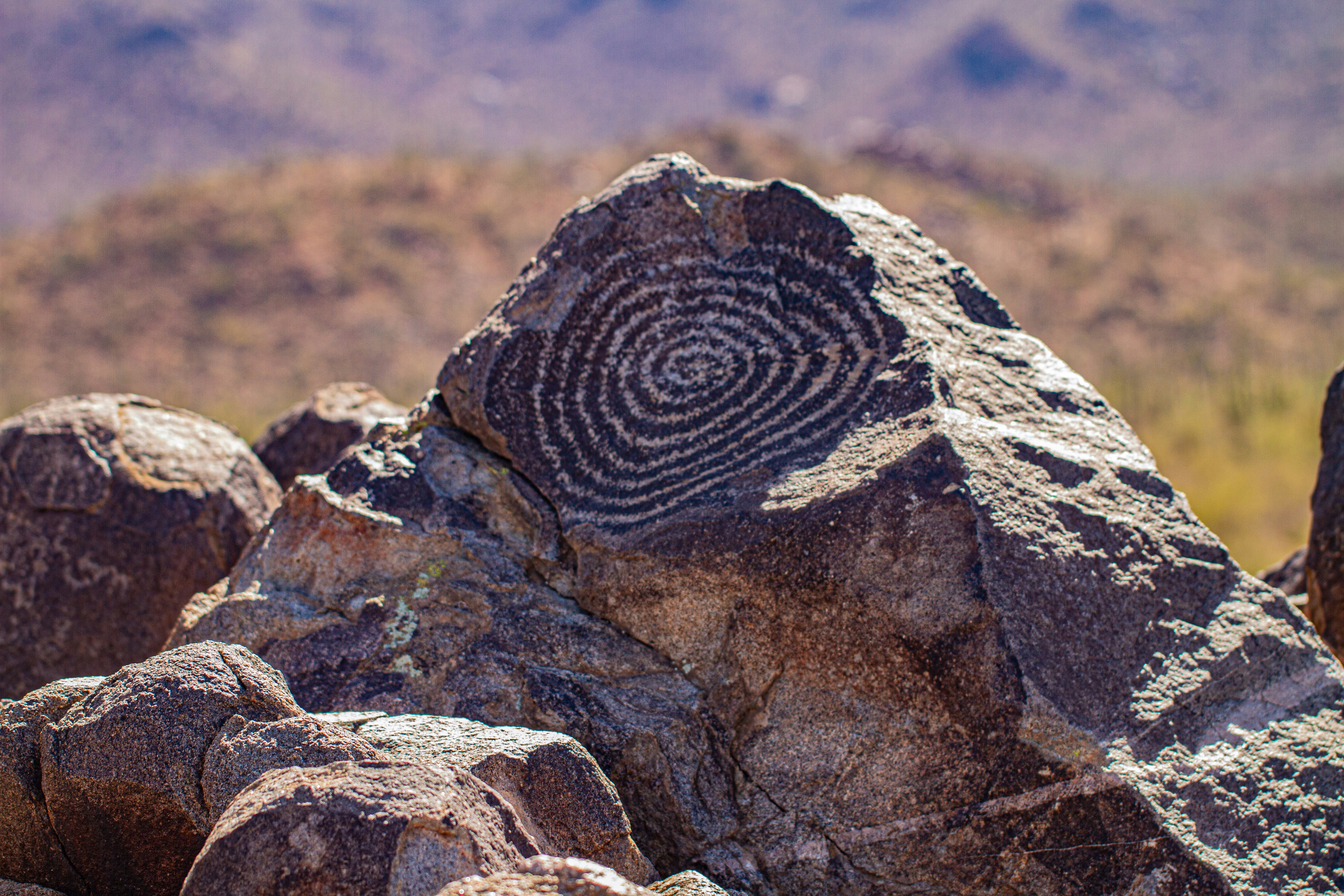 a rock with a heart carved into it, 
