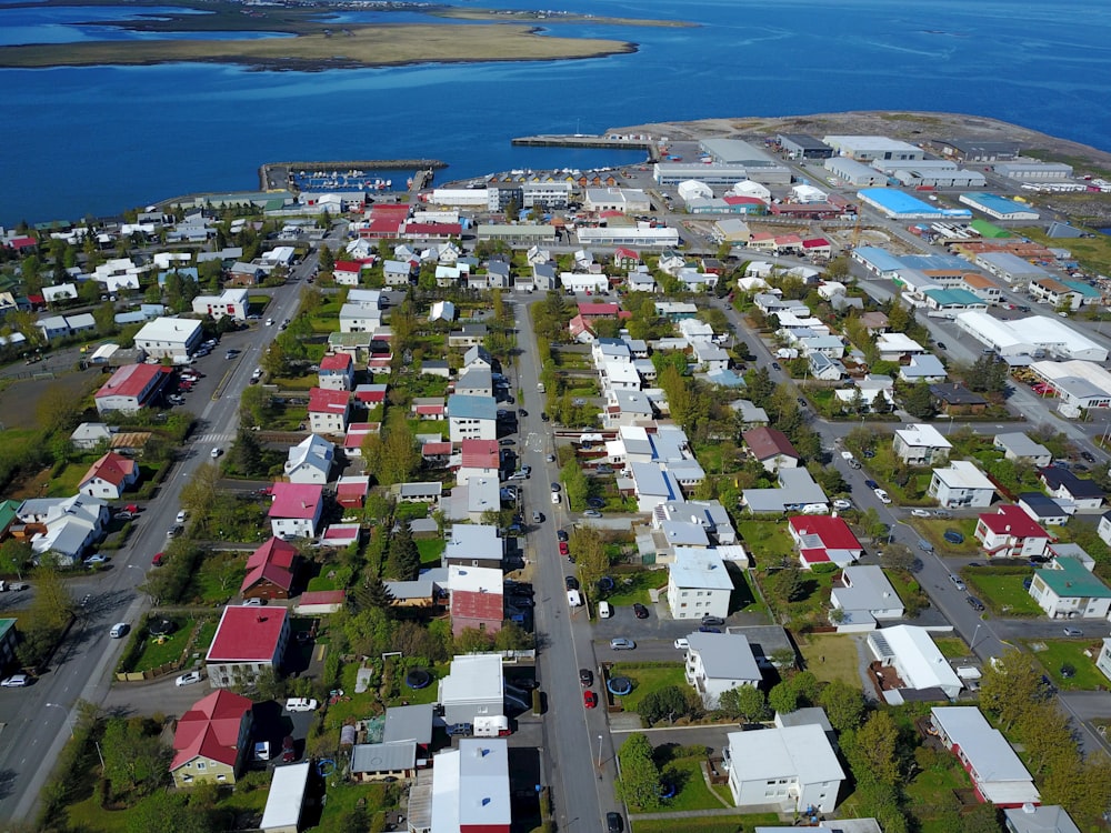 an aerial view of a city with lots of houses