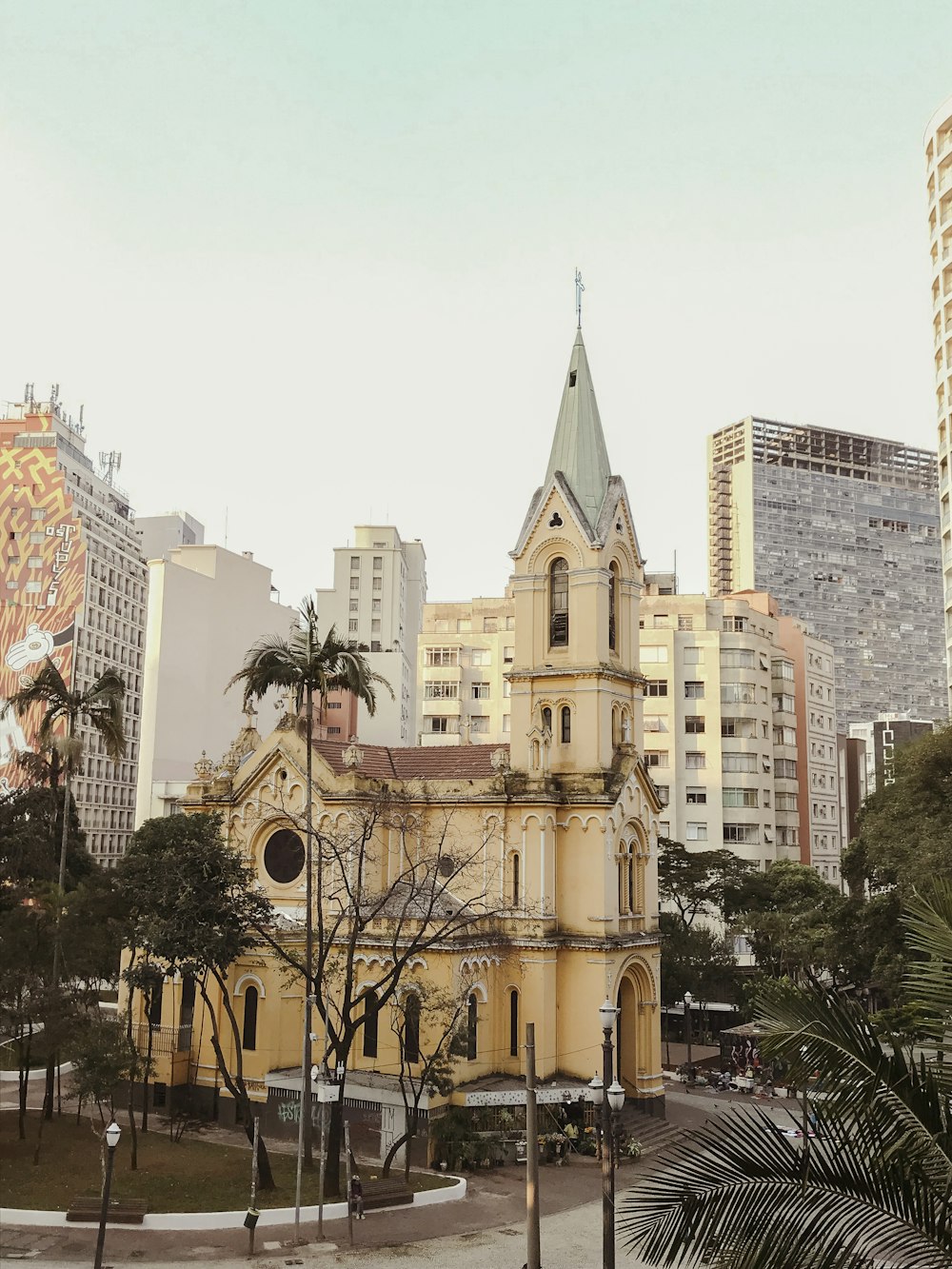 a church in a city with tall buildings