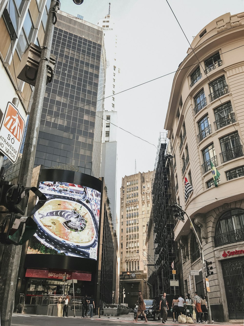 a city street filled with lots of tall buildings