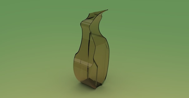 Close-up of a 3D printed geometric vase in tannengrün color with smooth texture.