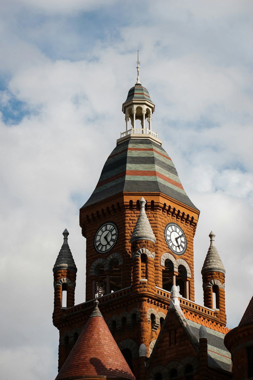 a large building with a clock on the top of it