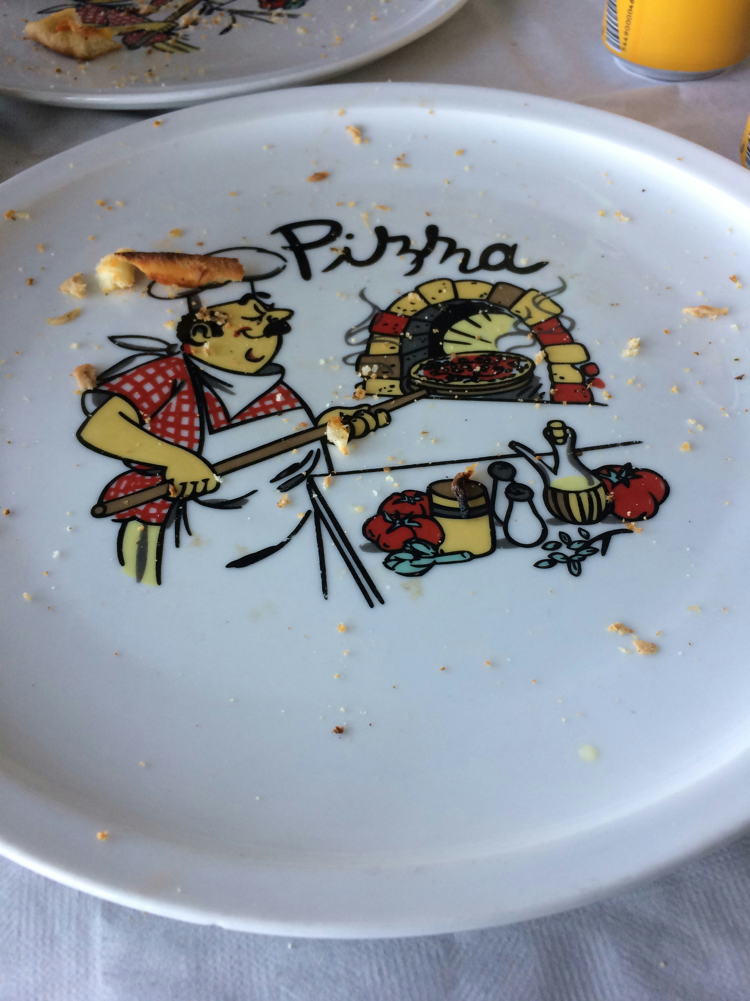a plate with a picture of a person cooking