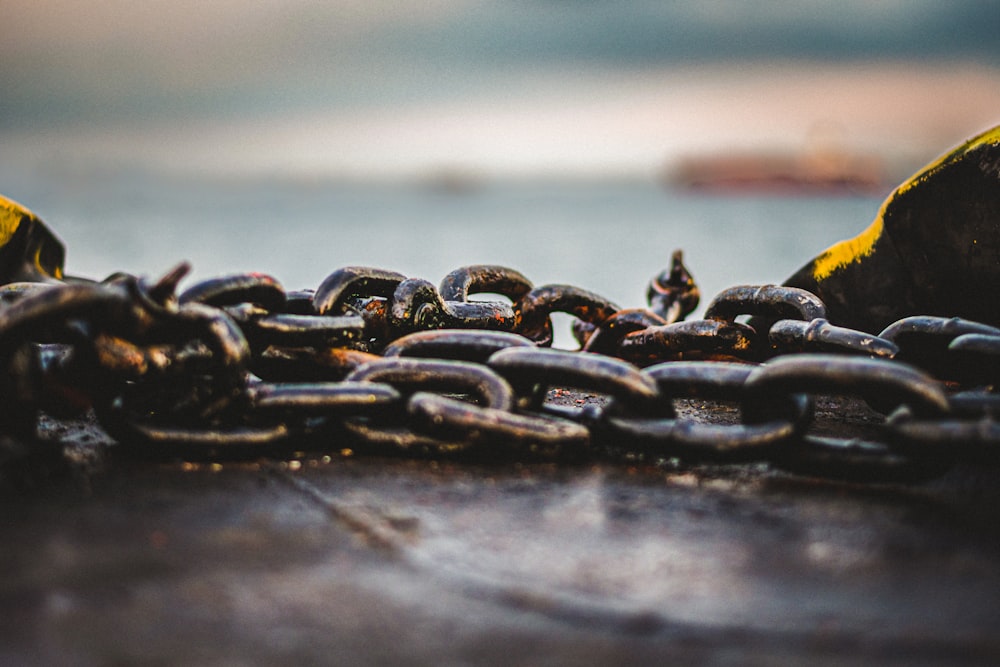 a close up of a chain on a table