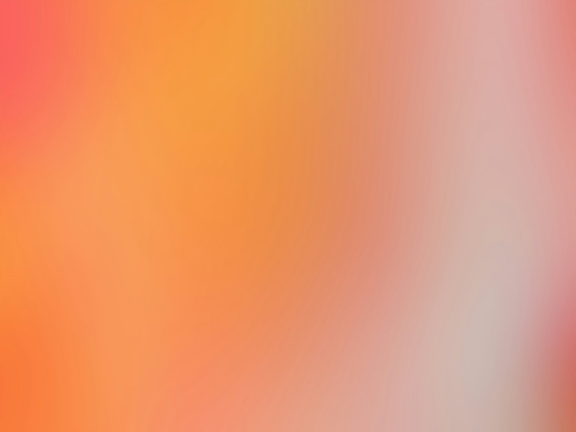 a blurry image of an orange and red background