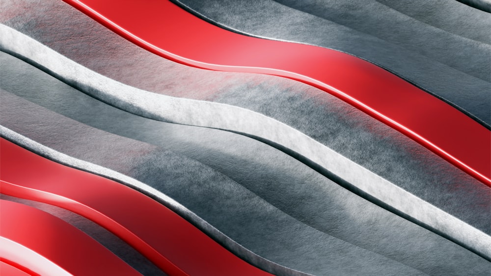 a close up of a red and silver background
