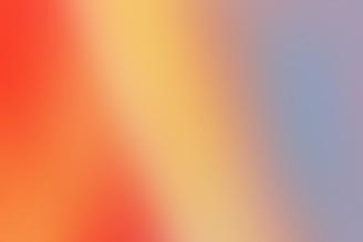 a blurry image of a red and yellow background