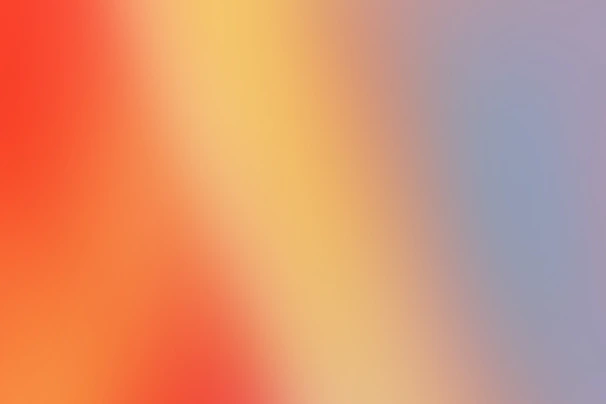 a blurry image of a red and yellow background
