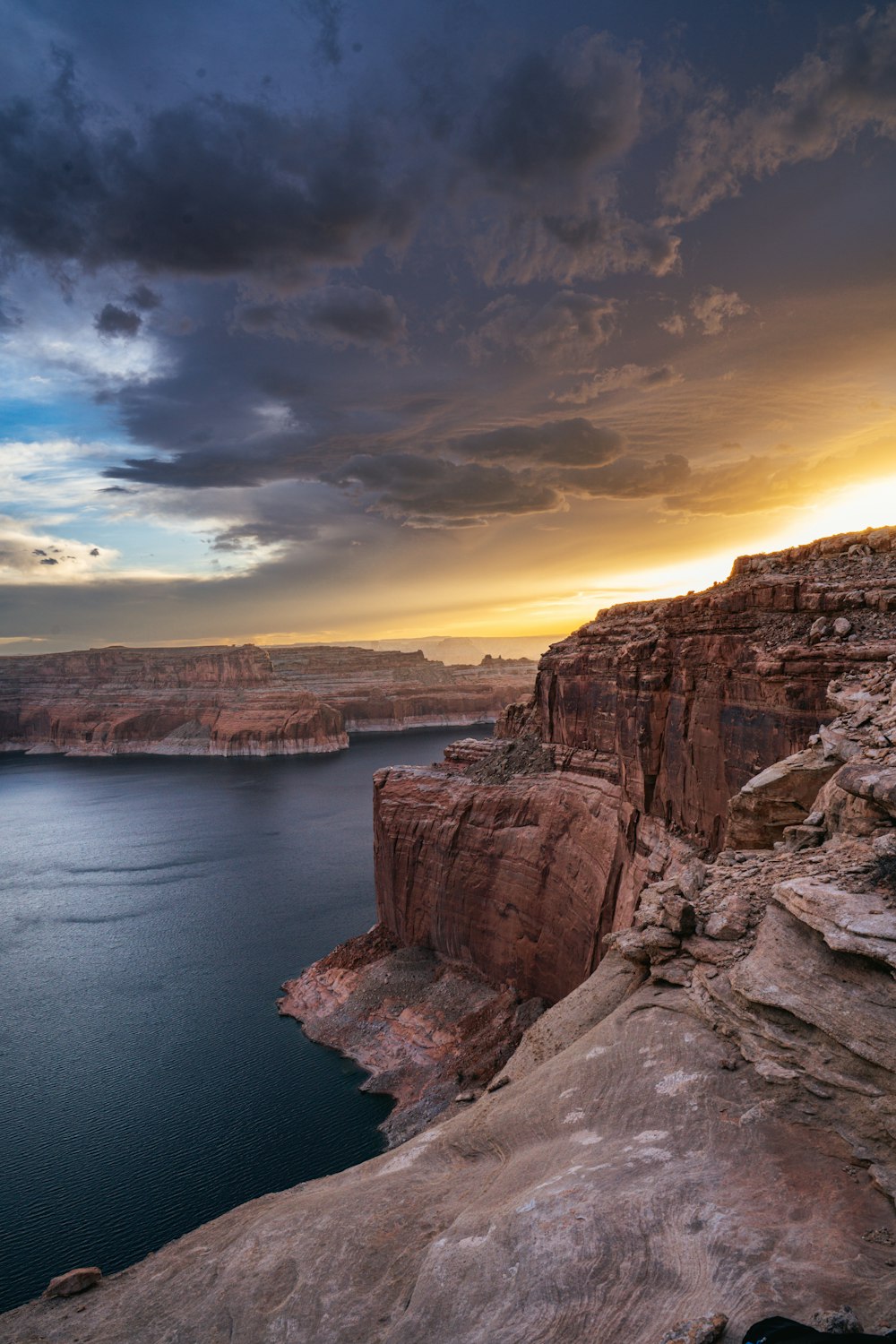 a large body of water surrounded by rocky cliffs