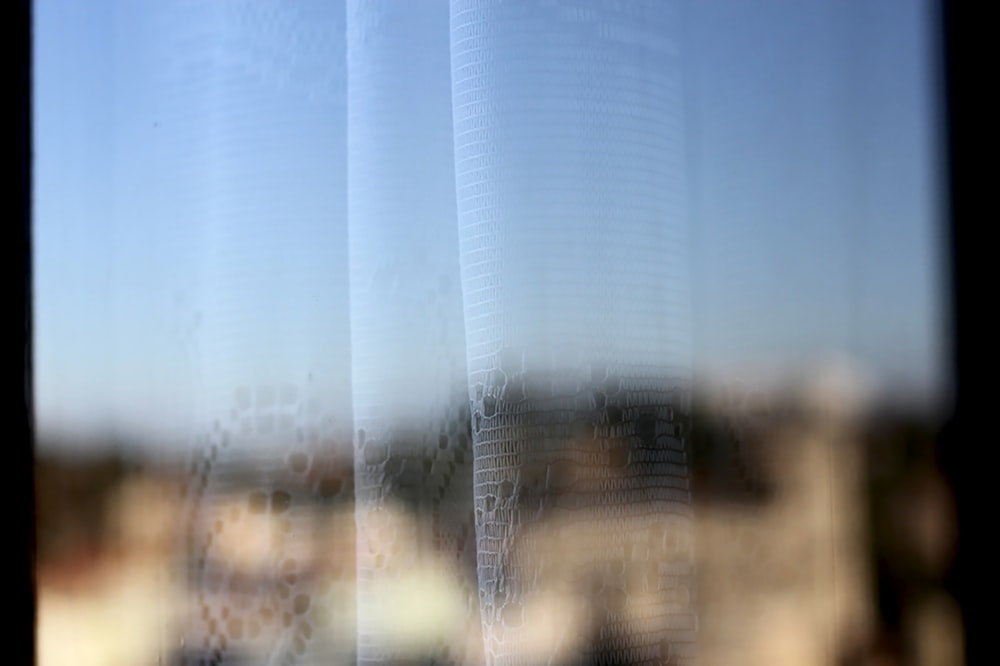 a blurry photo of a city seen through a window