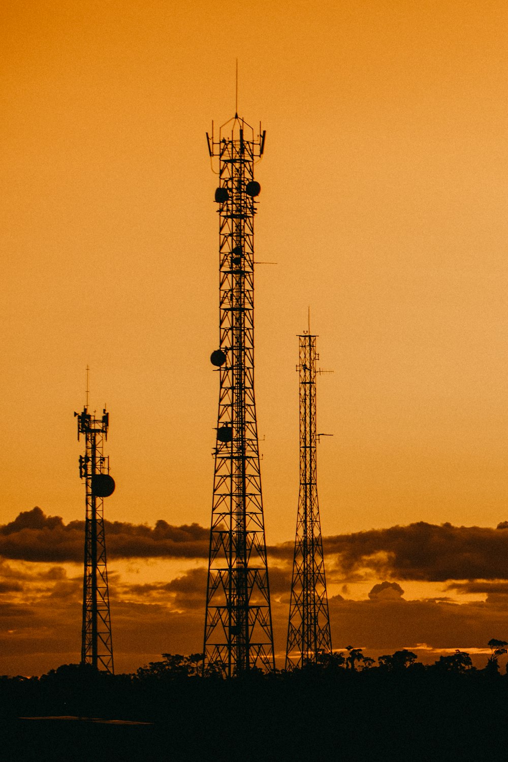 a very tall tower with a lot of antennas on top of it