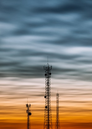 a couple of cell towers sitting next to each other