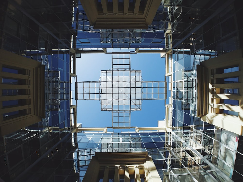 a very tall building with a cross in the middle of it