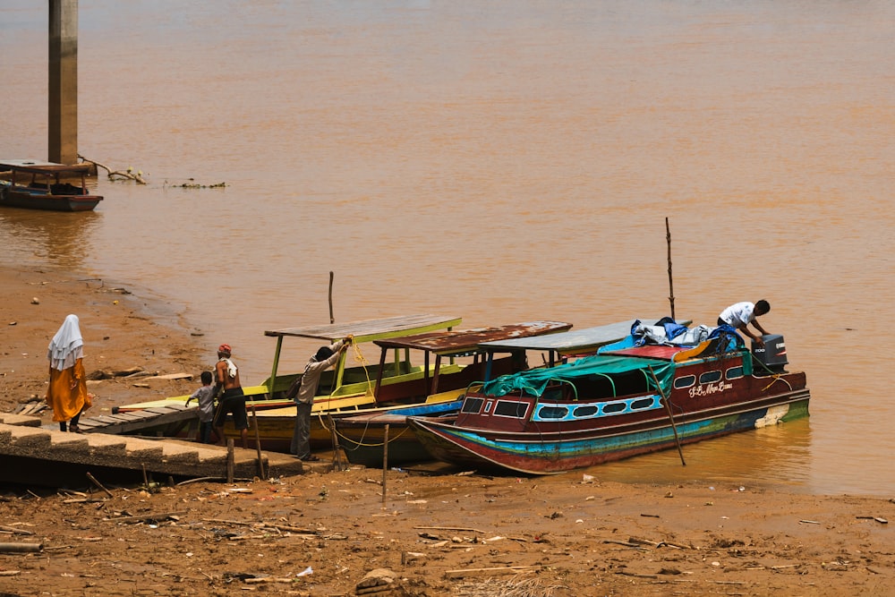 a couple of boats that are sitting in the water