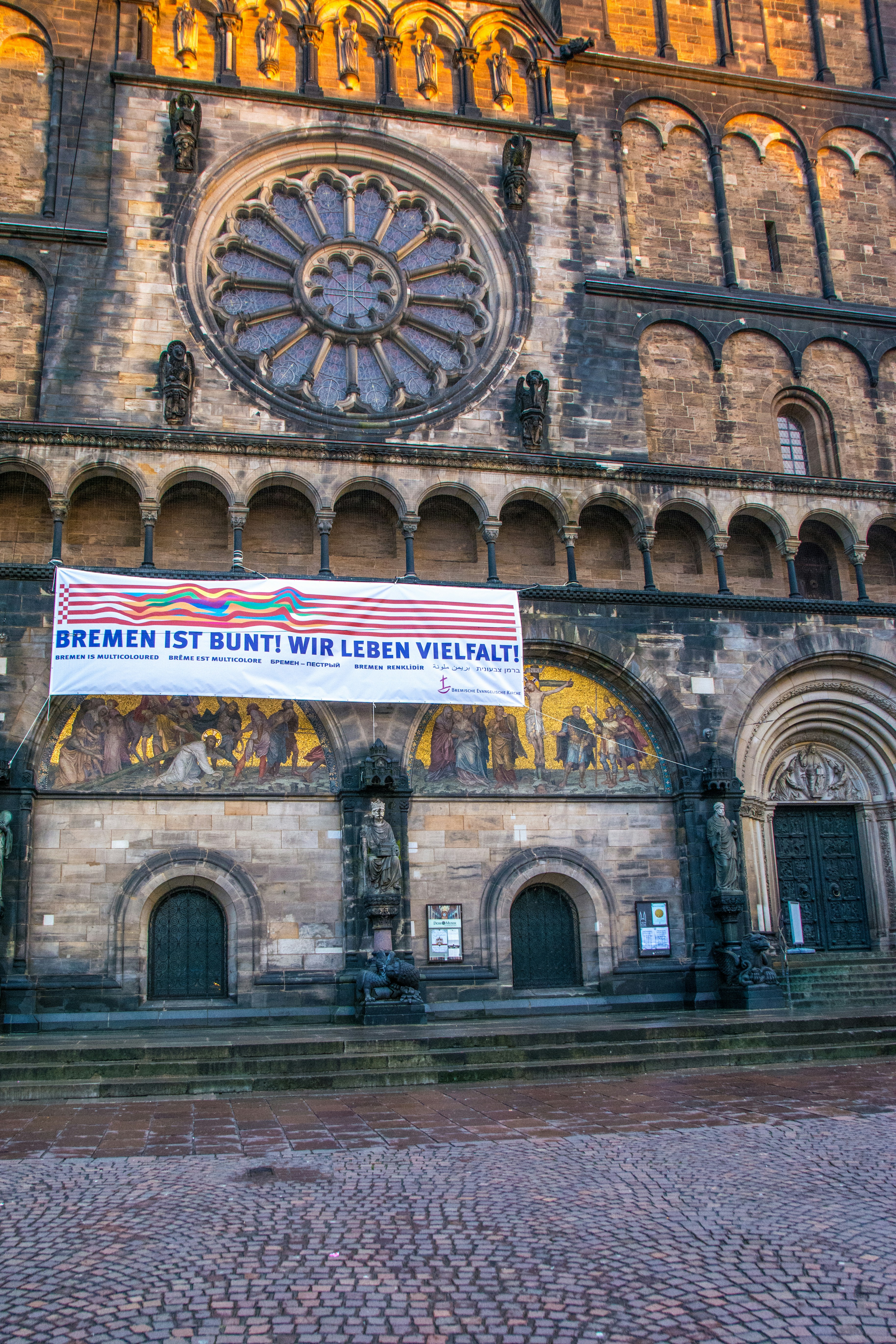 a large building with a large clock on it's side