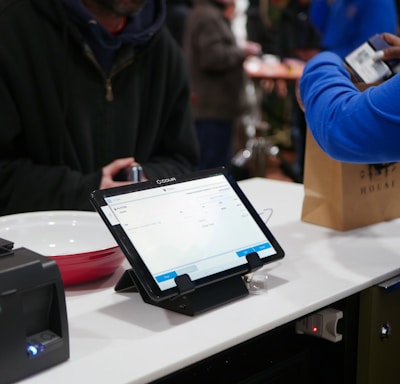 a tablet computer sitting on top of a table