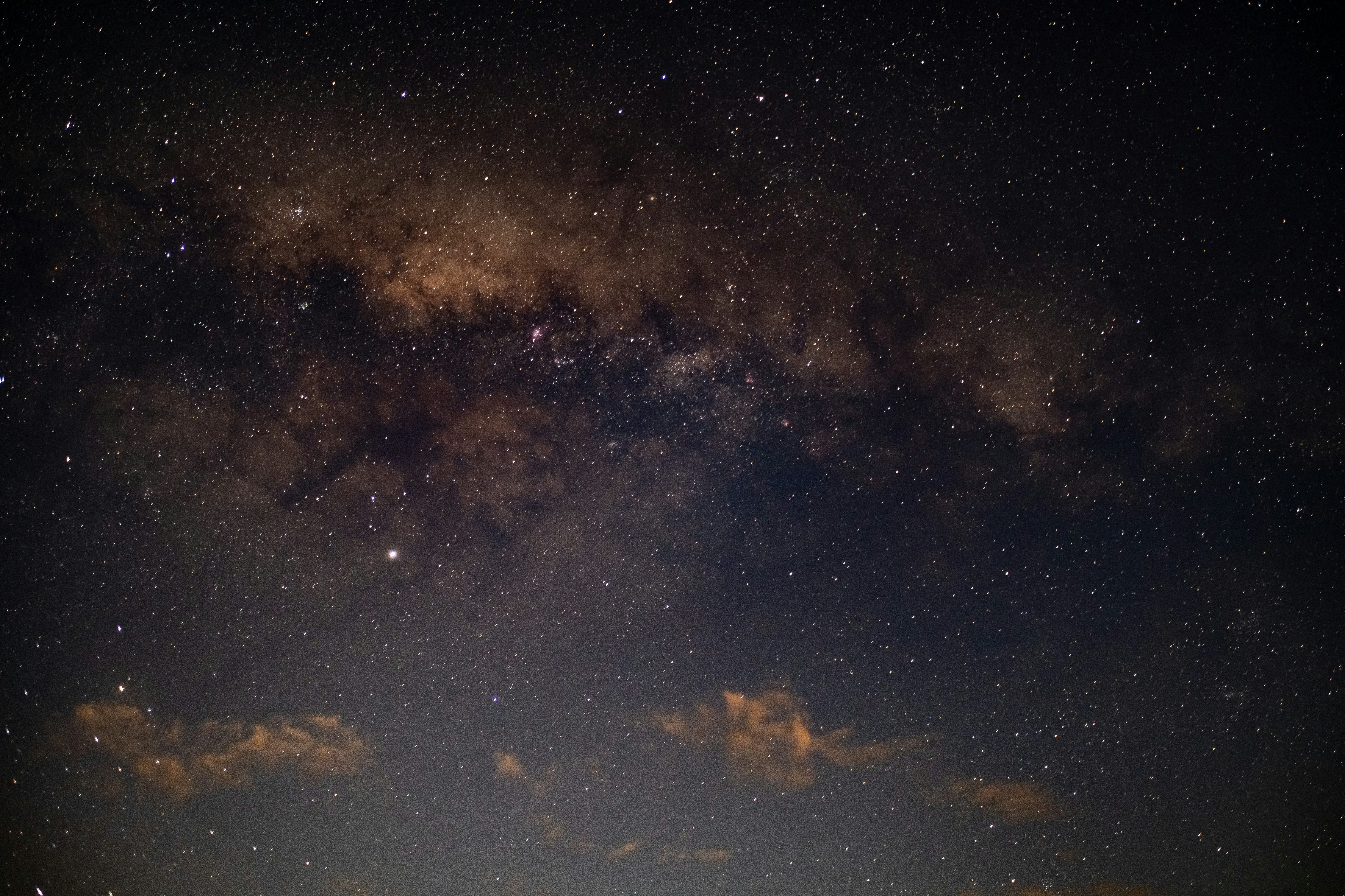 The night sky is filled with stars and clouds photo – Free