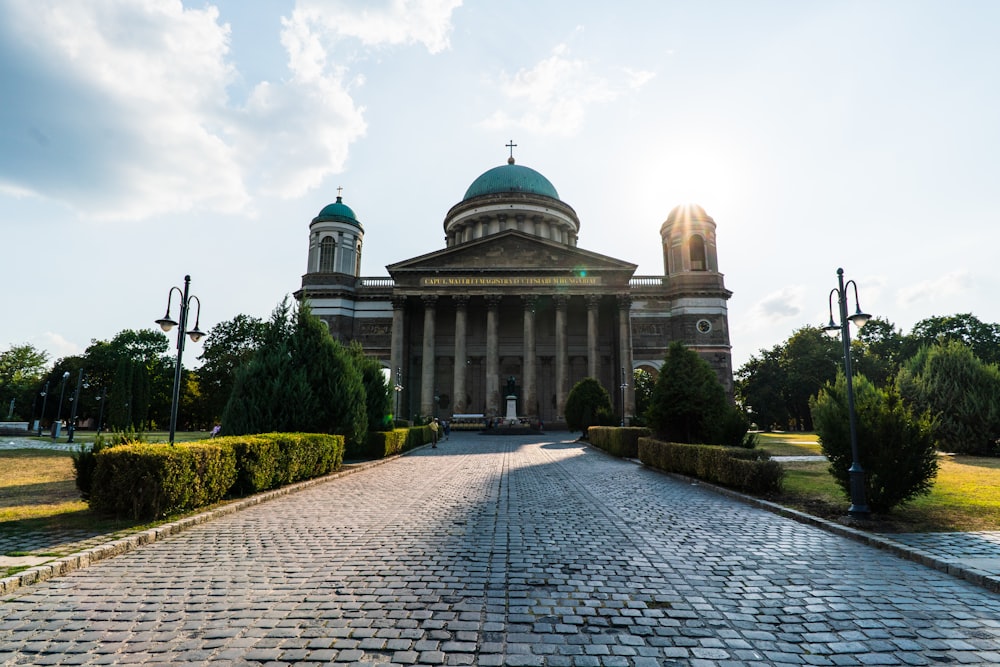 a large building with a green dome on top of it