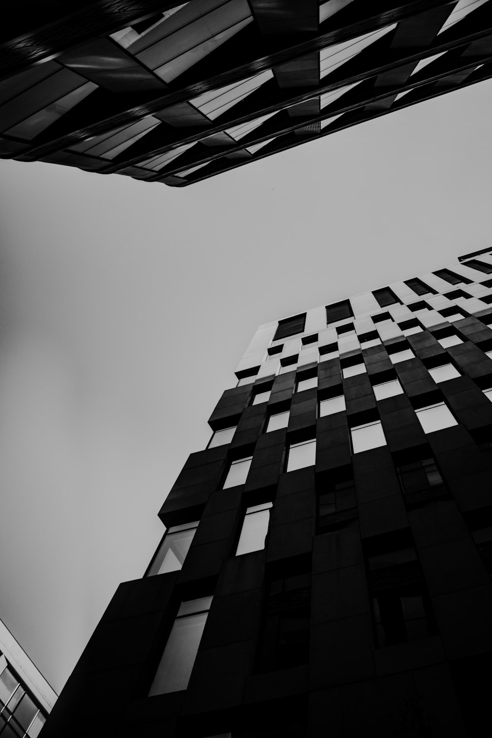 a black and white photo of a tall building