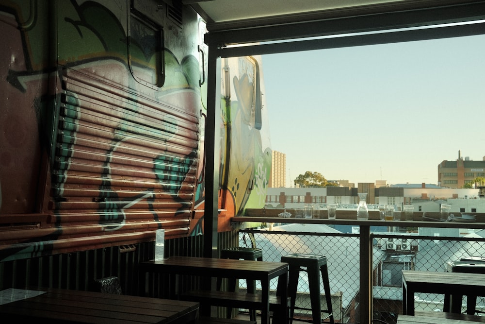 a view of a city from a restaurant window