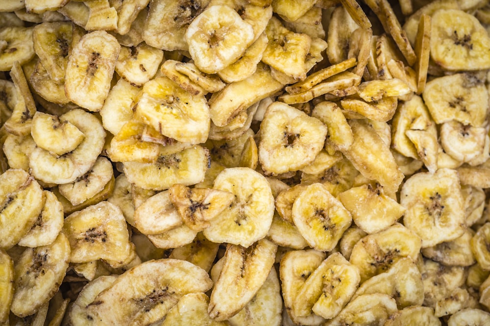 a pile of peeled bananas sitting on top of a table