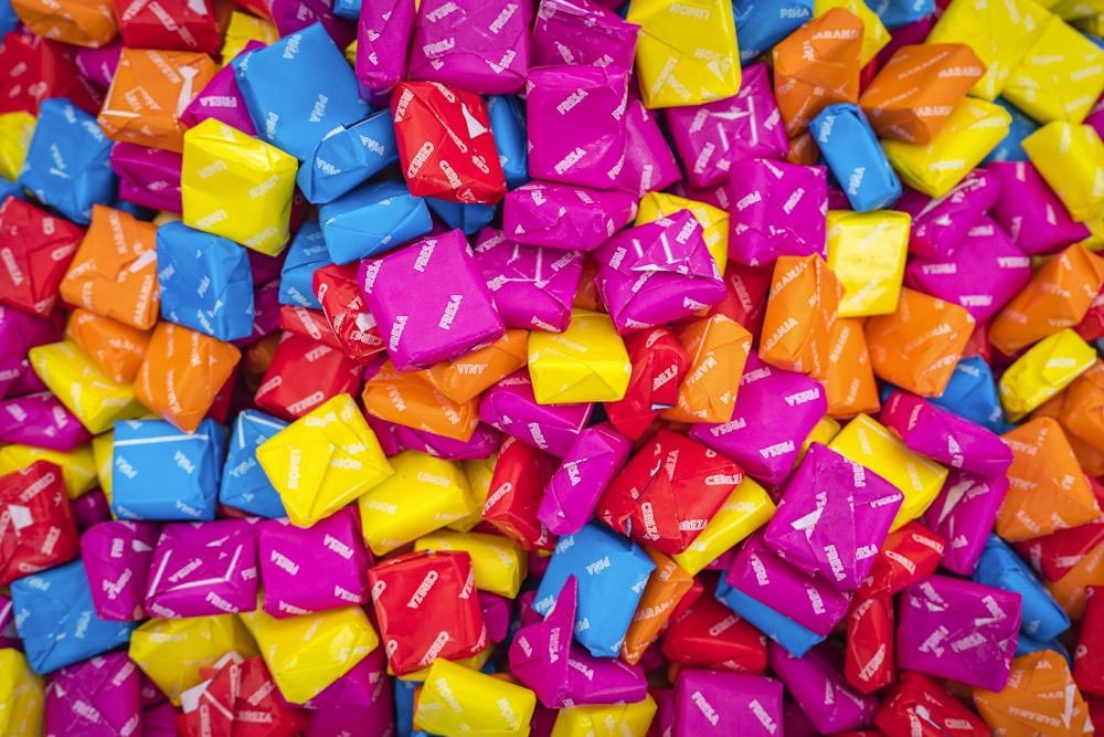 a pile of colorful candies sitting on top of each other