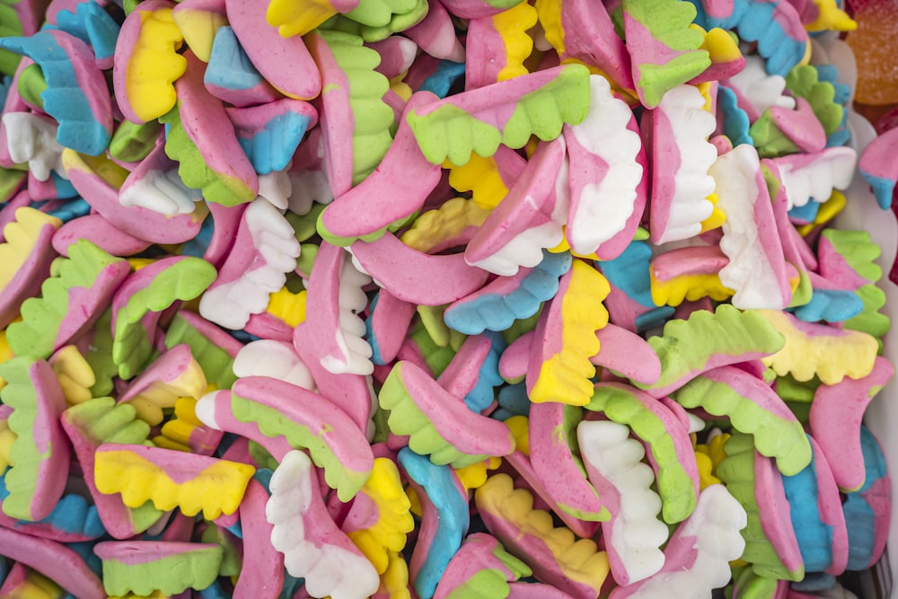 a close up of a pile of colorful cookies