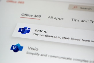 a close up of a computer screen with some stickers on it