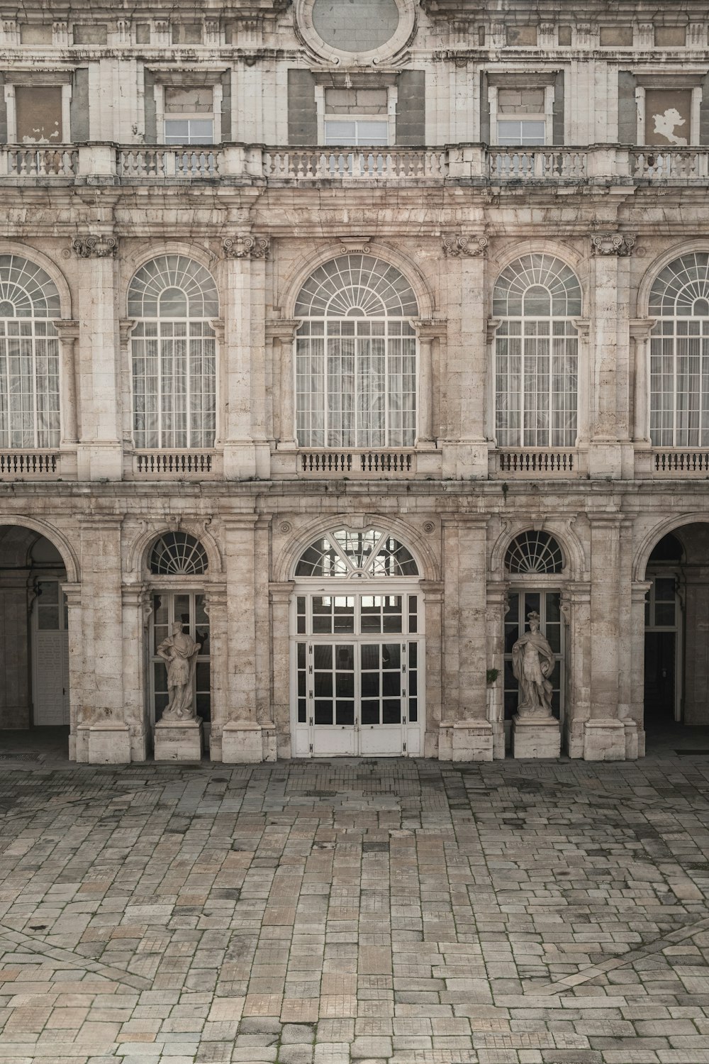 a large building with a clock on the front of it