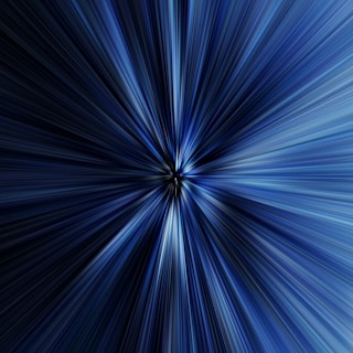 a blue background with a star burst in the middle