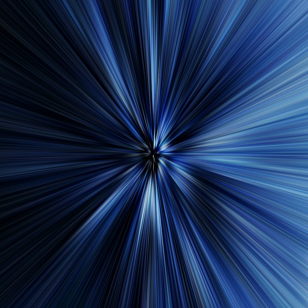 a blue background with a star burst in the middle