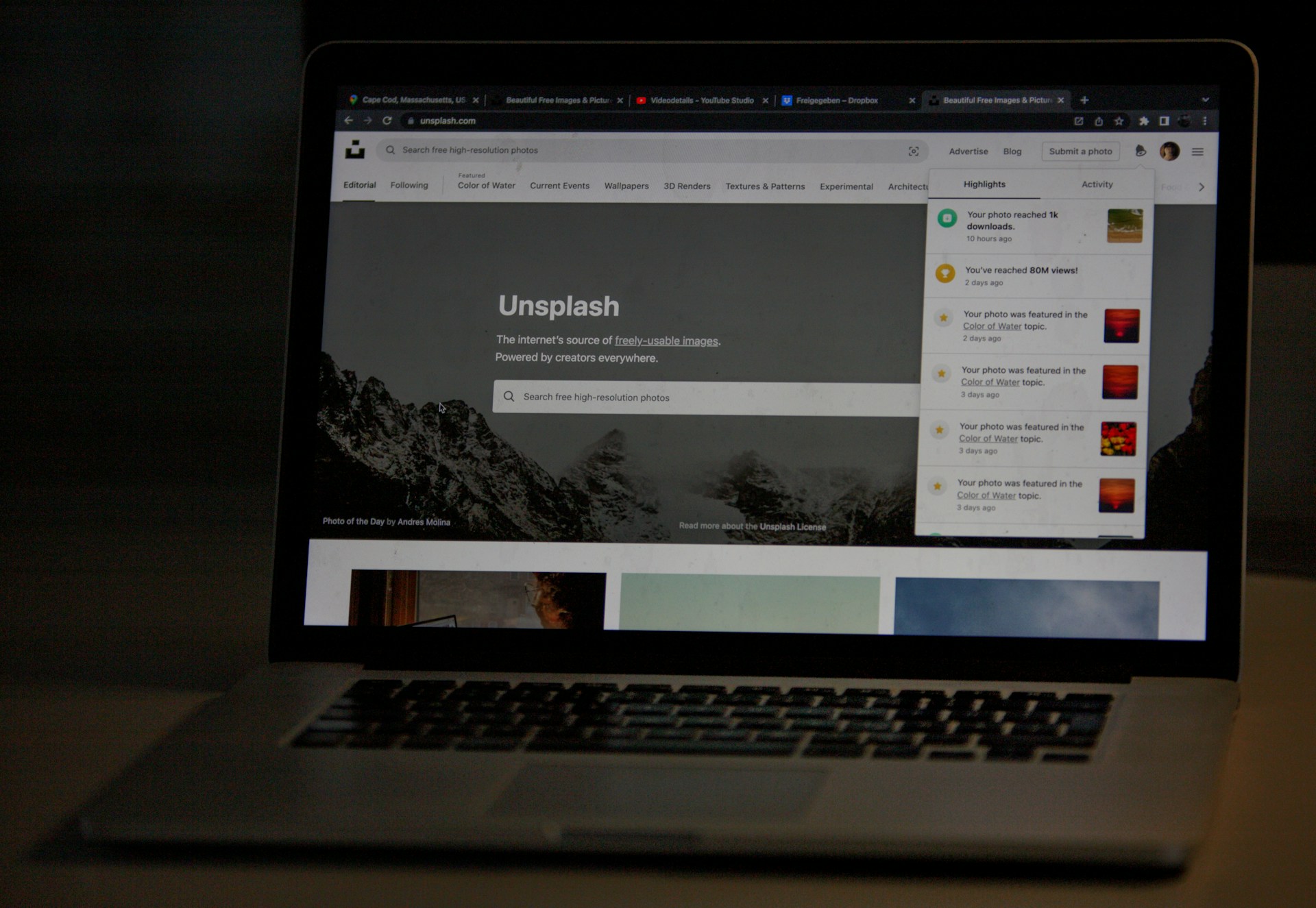 a laptop computer sitting on top of a desk