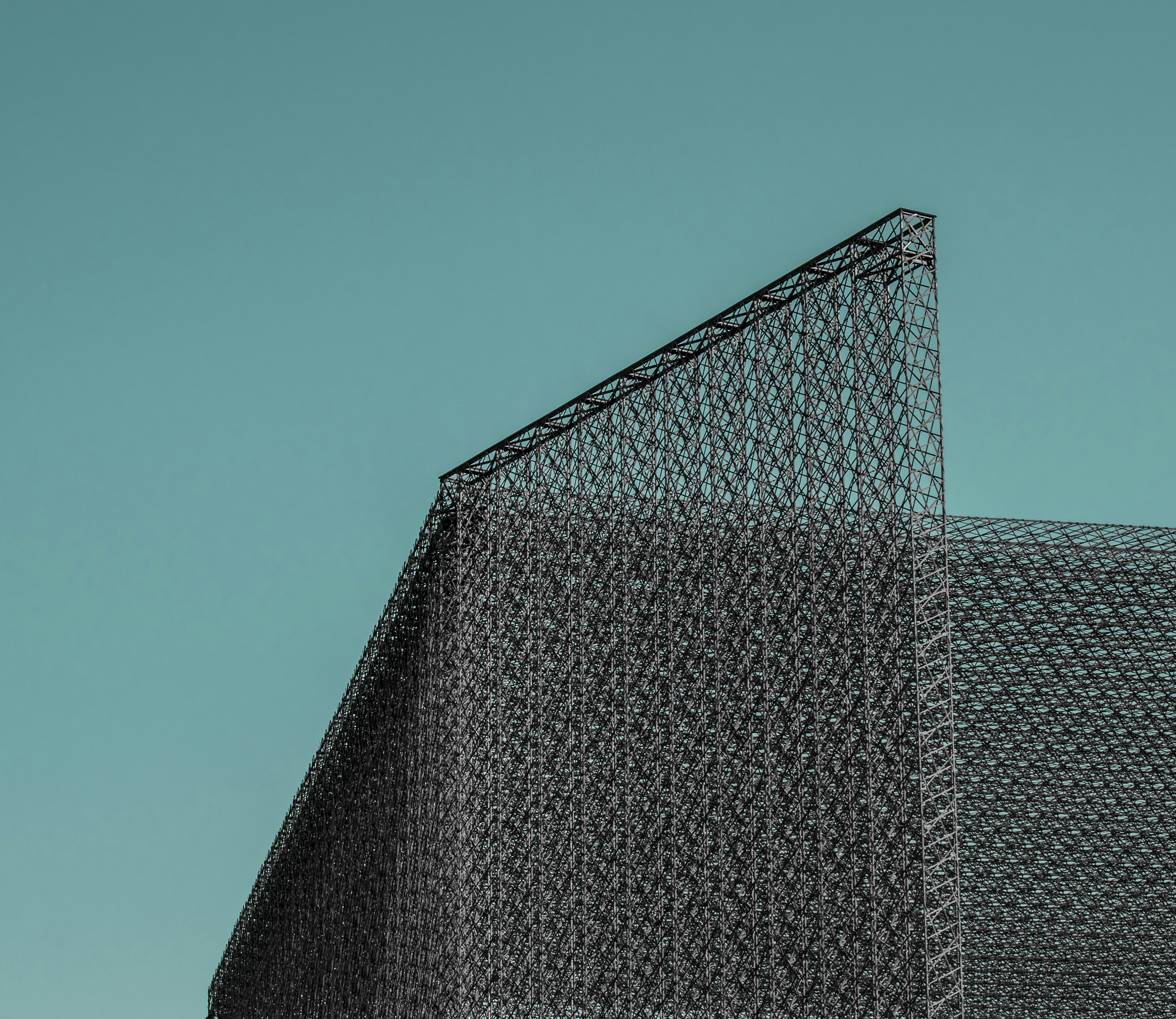 a large metal structure with a triangular roof