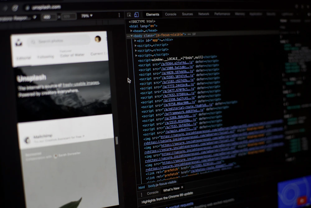 Website code and design on a computer screen representing the website and conversion rate rebuild