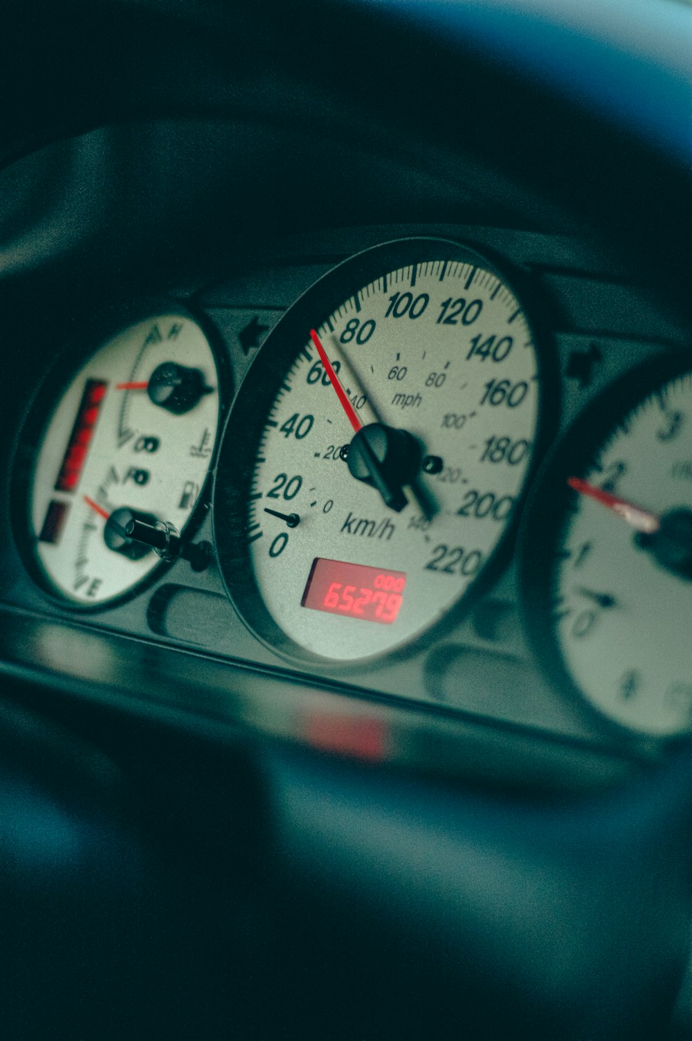 a close up of a speedometer in a car
