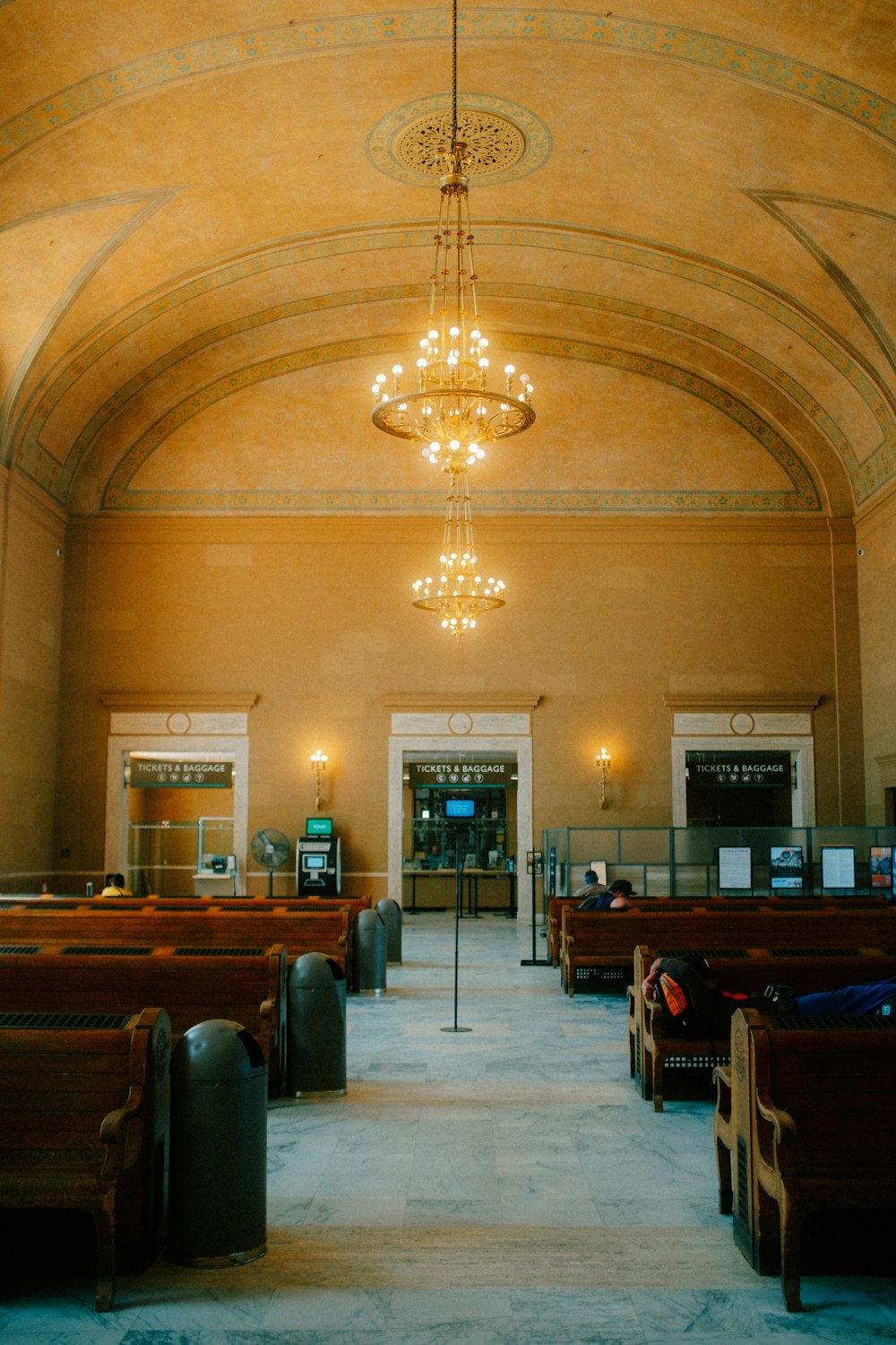 a church with a chandelier hanging from the ceiling