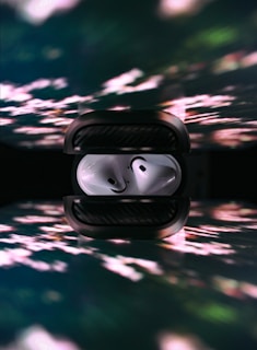 A dynamic image of Aobbow earbuds in action during a workout.