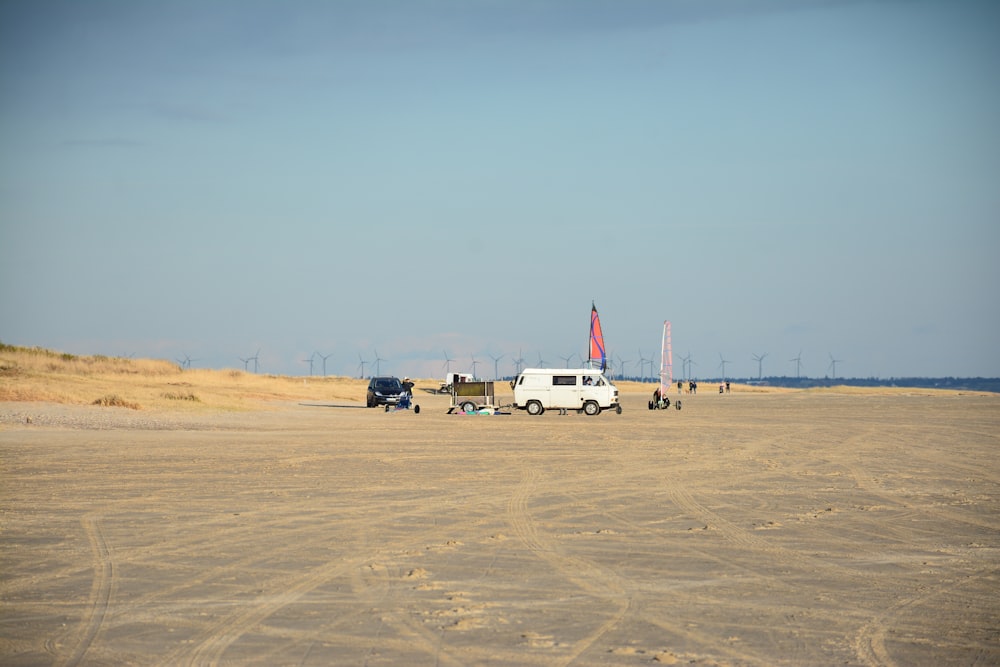 a van is parked in the middle of the desert